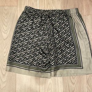 La greca shorts green black